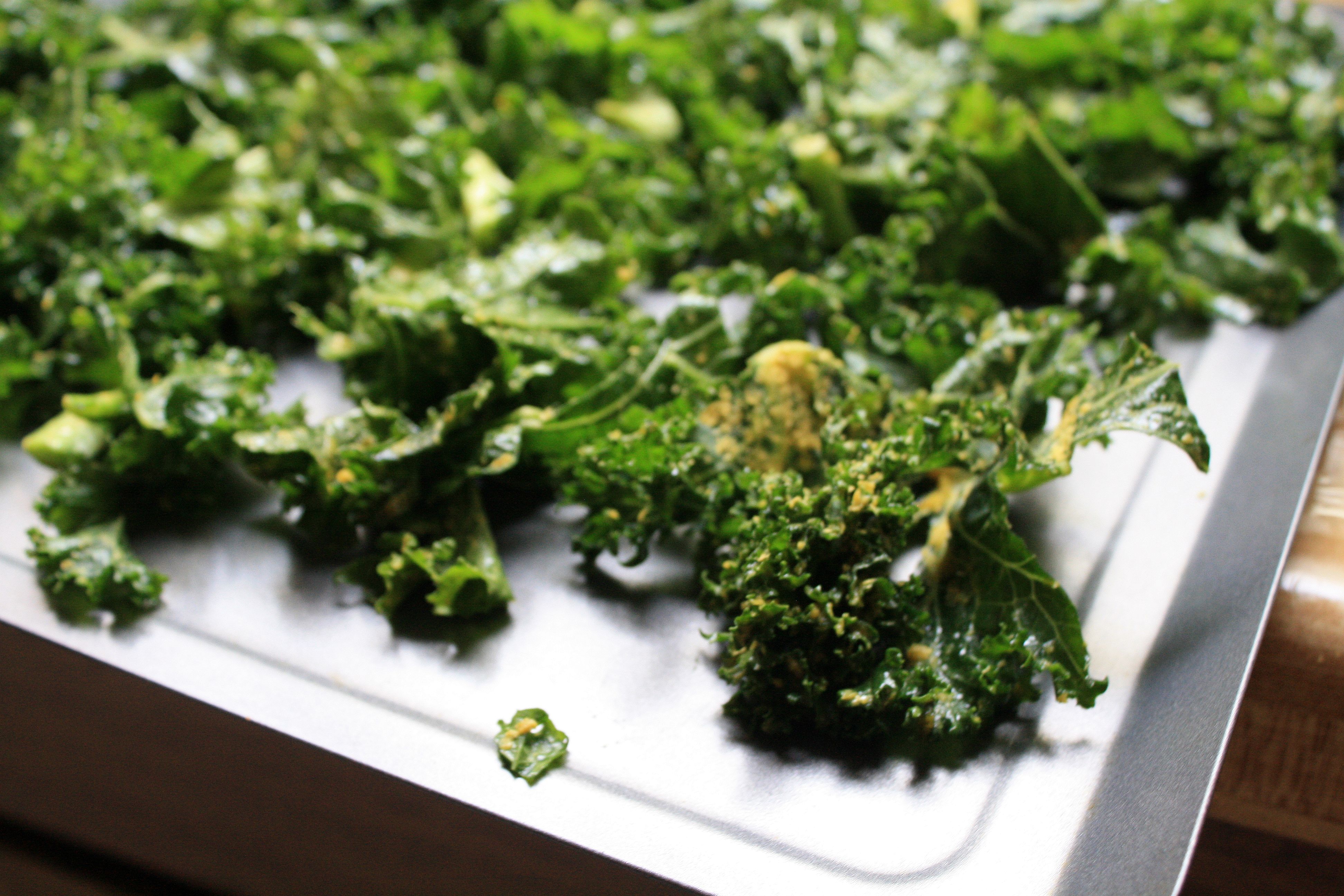 lay out kale pieces on pan and try to keep from overlapping