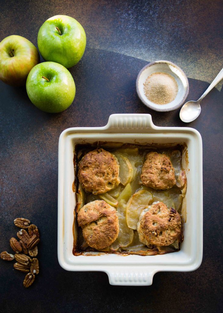 Top Apple Maple Pecan Cobbler with vanilla or cinnamon ice cream for a homey autumn teatime.