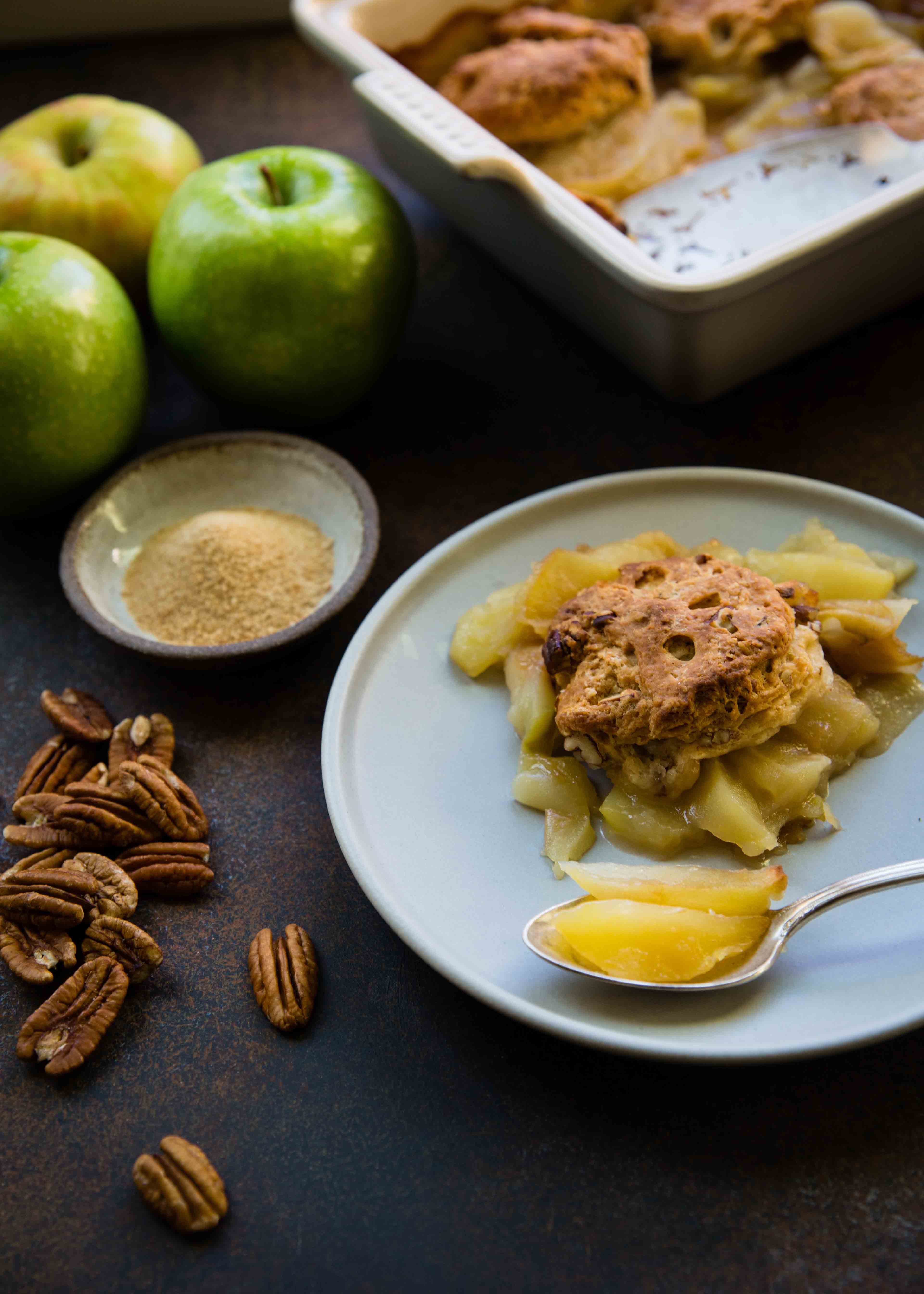 Maple sugar and spice and everything nice (like apples and pecans). Making an Apple Maple Pecan cobbler is an easy dessert to bake for a warming dessert.