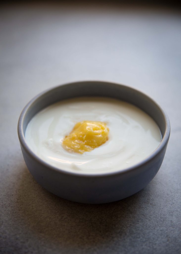 Have you ever tried Lemon Curd Yogurt? This is going to be your new favorite way to flavor plain yogurt for dessert.