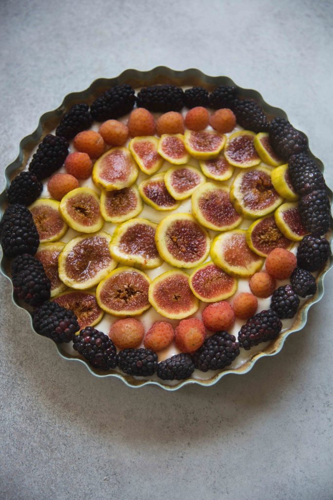 Fresh fruit tiled on top makes this yogurt jam tart a stunning dessert that's different each time.